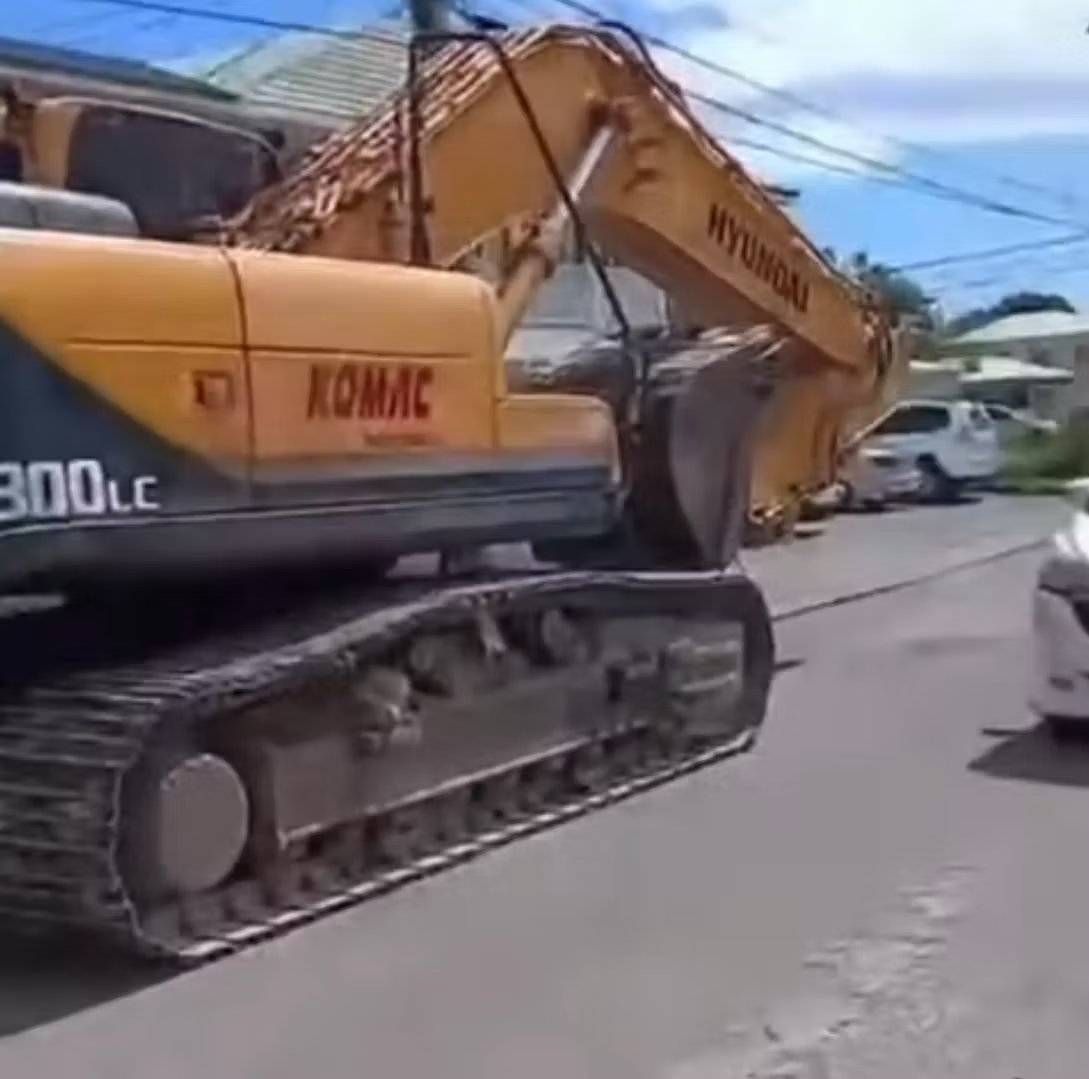 Viral Video of Excavator on Public Road Sparks Outrage Over Heavy Equipment Enforcement